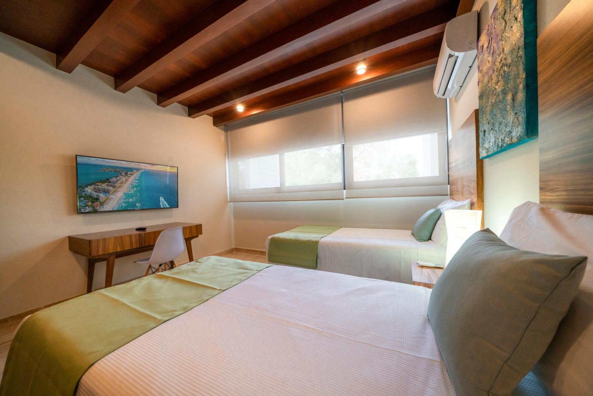 Сasa de vacaciones Luxury 2 Bedroom - Infinity Pool At Awa Residences In Playacar, Awa 107 Playa del Carmen